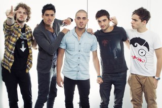 This Aug. 22, 2012 photo shows members of the British boy band "The Wanted", from left, Jay McGuiness, Siva Kaneswaran, Max George, Tom Parkerand Nathan Sykes posing for a portrait at JetBlue's T5 at JFK International Airport in New York. The Wanted, who had a hit this year with the party jam “Glad You Came,” are up against fellow brish band One Direction, Canadian sensation Carly Rae Jepsen, R&B singer Frank Ocean and pop-rockers fun. for best new artist at the MTV Video Music Awards on Sept. 6.  (Photo by Victoria Will/Invision/AP)