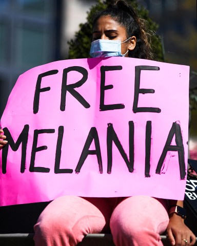 UNITED STATES - OCTOBER 17: A woman holds up a sign as she participates in the Women's March at Freedom Plaza in Washington on Saturday, Oct. 17, 2020. (Photo by Caroline Brehman/CQ Roll Call via AP Images)