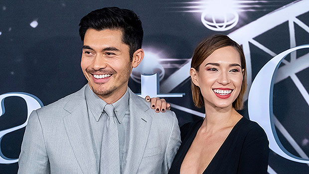 Henry Golding shares a sweet kiss with his pregnant wife Liv Lov