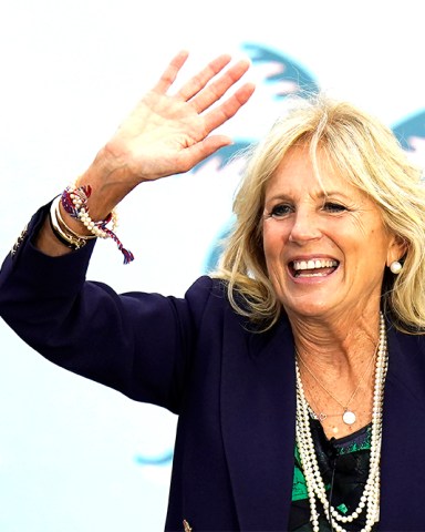 Jill Biden waves to supporters while campaigning for her husband Democratic presidential candidate and former Vice President Joe Biden, during a drive in rally Sunday, Nov. 1, 2020, in Tampa, Fla. (AP Photo/Chris O'Meara)