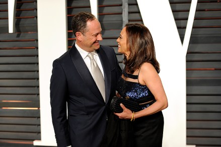Attorney Douglas Emhoff, left, and California Attorney General Kamala Harris arrive at the 2015 Vanity Fair Oscar Party on Sunday, Feb. 22, 2015, in Beverly Hills, Calif. (Photo by Evan Agostini/Invision/AP)