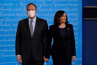 Democratic vice presidential candidate Sen. Kamala Harris, D-Calif., stands with her husband Douglas Emhoff during the vice presidential debate with Vice President Mike Pence Wednesday, Oct. 7, 2020, at Kingsbury Hall on the campus of the University of Utah in Salt Lake City. (AP Photo/Patrick Semansky)
