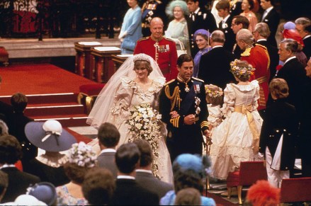 BRITISH ROYALTY ROYAL WEDDING FORMAL TRADITIONAL MARRIAGE BRITISH MONARCHY VEIL WEDDING GOWN BRIDE GROOM INSIDE CHURCH