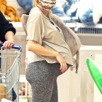 EXCLUSIVE: Emma Roberts puts her growing baby bump on display as she does some shopping at Ikea