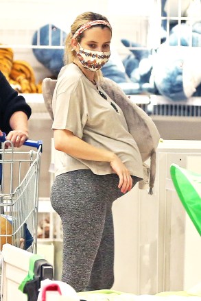 EXCLUSIVE: Emma Roberts puts her growing baby bump on display as she does some shopping at Ikea. 18 Nov 2020 Pictured: Emma Roberts. Photo credit: P&P / MEGA TheMegaAgency.com +1 888 505 6342 (Mega Agency TagID: MEGA715984_007.jpg) [Photo via Mega Agency]