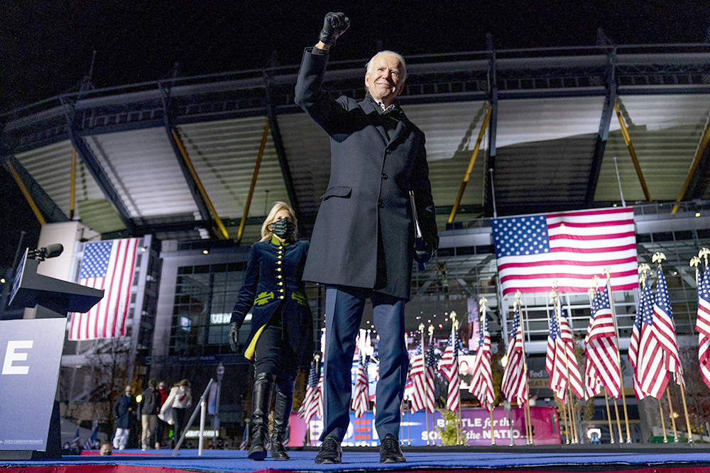 Jill Biden, the wife of Democratic presidential candidate former Vice President Joe Biden, comes on stage as he finishes speaking at a drive-In rally at Heinz Field in Pittsburgh, Monday, Nov. 2, 2020. (AP Photo/Andrew Harnik)