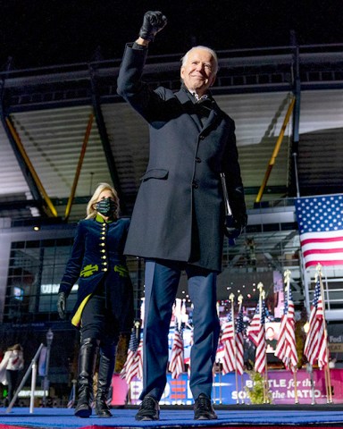 Jill Biden, the wife of Democratic presidential candidate former Vice President Joe Biden, comes on stage as he finishes speaking at a drive-In rally at Heinz Field in Pittsburgh, Monday, Nov. 2, 2020. (AP Photo/Andrew Harnik)