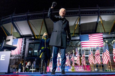 Jill Biden, the wife of Democratic presidential candidate former Vice President Joe Biden, comes on stage as he finishes speaking at a drive-In rally at Heinz Field in Pittsburgh, Monday, Nov. 2, 2020. (AP Photo/Andrew Harnik)