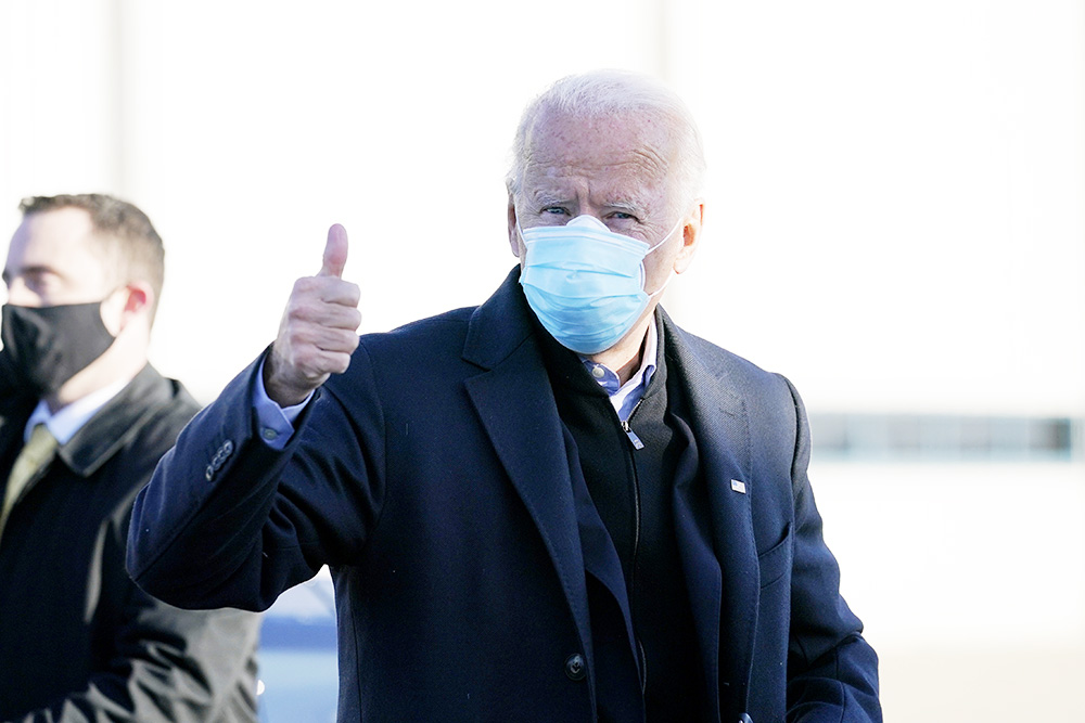 Democratic presidential candidate former Vice President Joe Biden arrives to board his campaign plane at New Castle Airport in New Castle, Del., on Election Day, Tuesday, Nov. 3, 2020, en route to Scranton, Pa. (AP Photo/Carolyn Kaster)