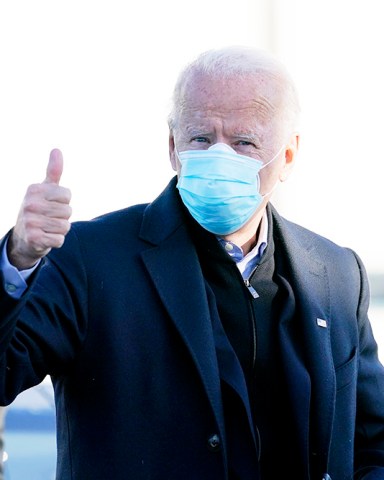 Democratic presidential candidate former Vice President Joe Biden arrives to board his campaign plane at New Castle Airport in New Castle, Del., on Election Day, Tuesday, Nov. 3, 2020, en route to Scranton, Pa. (AP Photo/Carolyn Kaster)