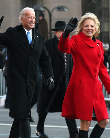 Vice President Joe Biden and his wife Jill walk along Pennsylvania Avenue Tuesday, Jan. 20, 2009, in Washington, during the inaugural parade. (AP Photo/Clarissa M. Rucker)