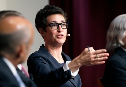 MSNBC television anchor Rachel Maddow, host of the Rachel Maddow Show, moderates a panel, Monday, Oct. 16, 2017, at a forum called "Perspectives on National Security," at the John F. Kennedy School of Government, on the campus of Harvard University, in Cambridge, Mass. (AP Photo/Steven Senne)