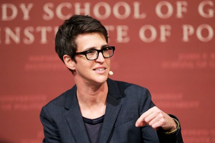 FILE - In this Oct. 16, 2017 file photo, MSNBC television anchor Rachel Maddow, host of "The Rachel Maddow Show," moderates a panel at a forum called "Perspectives on National Security," at the John F. Kennedy School of Government, at Harvard University, in Cambridge, Mass. MSNBC's Rachel Maddow said Friday, Nov. 6, 2020 she is quarantining after being in contact with someone who tested positive for the coronavirus. Maddow said on social media that she tested negative so far for COVID-19 but plans to remain at home until it's “safe for me to be back at work without putting anyone at risk.” (AP Photo/Steven Senne, File)