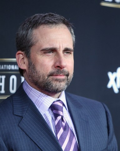 Actor Steve Carrell walks the red carpet before the NFL Honors awards show at the Mahalia Jackson Theatre on Saturday, February 2, 2013 in New Orleans, LA. (AP Photo/Ben Liebenberg)