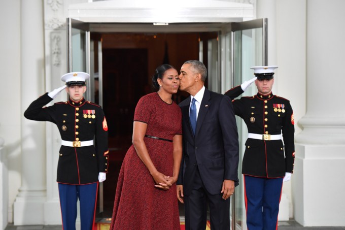 Barack Obama gives wife Michelle a sweet kiss