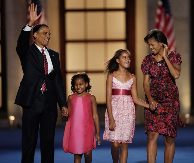 Barack and Michelle Obama with their young daughters Malia and Sasha Obama