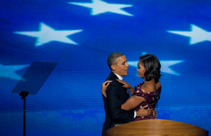 Barack and Michelle Obama hug at the 2012 Democratic National Convention