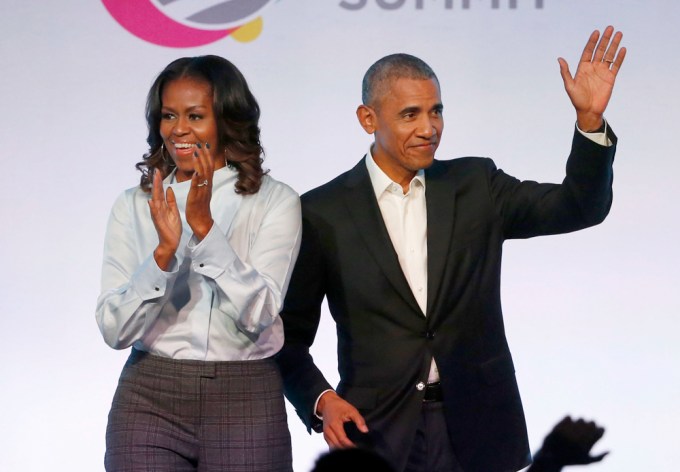 Barack and Michelle Obamas speak at their foundation’s summit