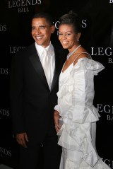 FILE - This May 14, 2005 file photo shows then-Senator Barack Obama and his wife Michelle as they arrive at the Legends Ball, an award ceremony hosted by Oprah Winfrey in Santa Barbara, Calif. Michelle is wearing a gown designed by Maria Pinto.  After making her mark on fashion by creating clothing for first lady Michelle Obama and other celebrities, designer Maria Pinto says she's closing her Chicago boutique because of the poor economy. (AP Photo/Michael A. Mariant, FILE)