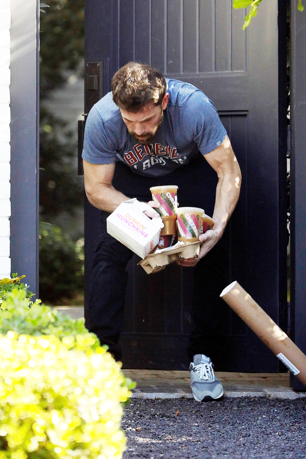 Ben Affleck's Pants Start Falling While He Holds Packages & Coffee