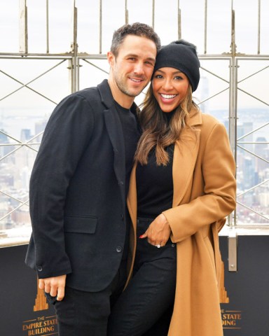 Tayshia Adams and Zac Clark
Tayshia Adams and Zac Clark visit the Empire State Building, New York, USA - 12 Feb 2021
Tayshia Adams, podcast host and star of 'The Bachelorette' Season 16, will be joined by her fiancee Zac Clark for a visit to the Empire State Building to kick off Valentine's Day weekend and celebrate the couple's move together to New York City on Friday, February 12.