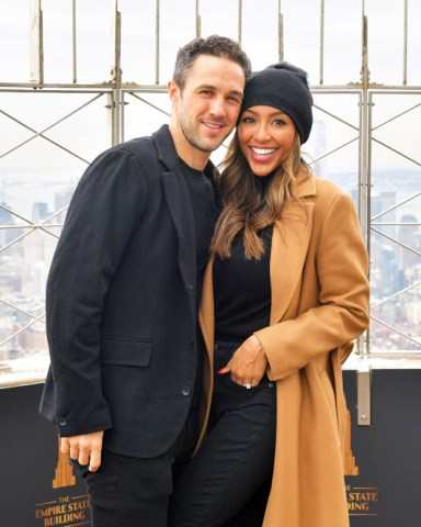 Tayshia Adams and Zac Clark Tayshia Adams and Zac Clark visit the Empire State Building, New York, USA - 12 Feb 2021 Tayshia Adams, podcast host and star of 'The Bachelorette' Season 16, will be joined by her fiancee Zac Clark for a visit to the Empire State Building to kick off Valentine's Day weekend and celebrate the couple's move together to New York City on Friday, February 12.