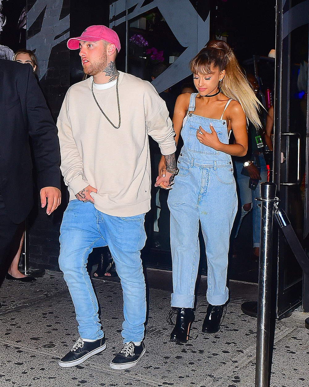 Ariana Grande and her new boyfriend, Mac Miller, were spotted leaving the Republic Records VMA After Party on Sunday night in NYC. The new couple wore matching Denim outfits as they held hands while exiting 