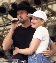 **FILE** Country music singers Tim McGraw and his wife, Faith Hill, perform together at the Internatonal Country Music Fan Fair festival in Nashville, Tenn., in this file photo from June 17, 1997.  The dual will return this summer for another go-round of their hugely successful Soul2Soul tour. "This is why we get into this business," McGraw said Wednesday March 7, 2007, in announcing the shows with Hill. "To be on stage and sing in front of thousands of people." (AP Photo/Mark Humphrey-File)