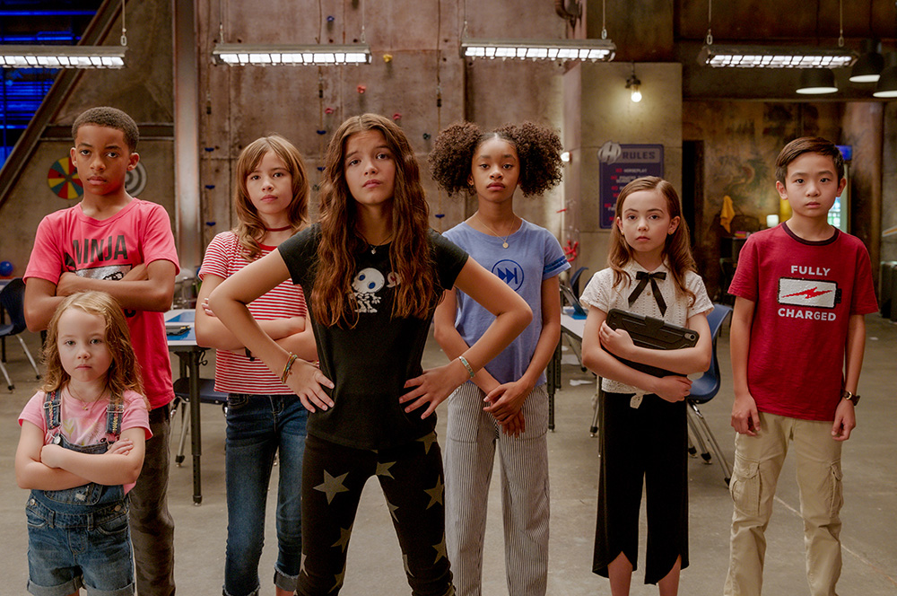 We Can Be Heroes: (L-R)  Vivien Blair as Guppy, Isaiah Russell-Bailey as Rewind, Lotus Blossom as A Capella, YaYa Gosselin as Missy Moreno, Akira Akbar as Fast Forward, Hala Finley as Ojo, Dylan Henry Lau as Slo-Mo. Cr. Ryan Green/NETFLIX © 2020