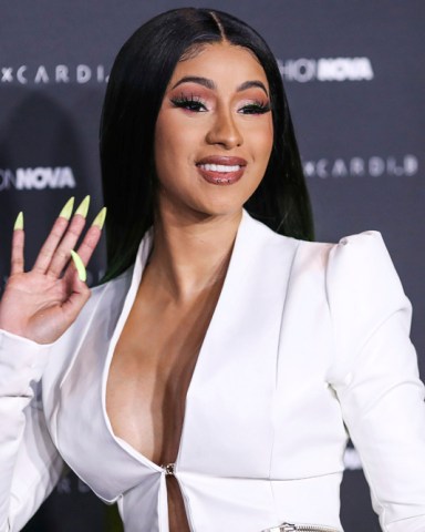 HOLLYWOOD, LOS ANGELES, CA, USA - MAY 08: Rapper Cardi B arrives at the Fashion Nova x Cardi B Collection Launch Party held at the Hollywood Palladium on May 8, 2019 in Hollywood, Los Angeles, California, United States. (Photo by Xavier Collin/Image Press Agency/Sipa USA)(Sipa via AP Images)