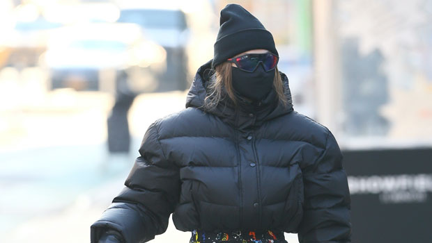 Gigi Hadid sports a black puffer jacket and leggings while out with her  baby daughter in