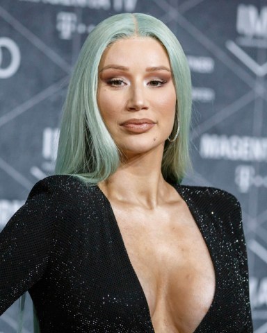 Photo by: KGC-324-RC/STAR MAX/IPx 2020 6/11/20 Iggy Azalea confirms she has become a mother. STAR MAX File Photo: 11/22/19 Iggy Azalea at the International Music Awards 2019 at the Verti Music Hall in Berlin, Germany.