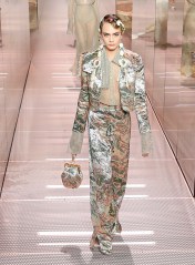 Model Cara Delevingne wears a creation for Fendi's Spring-Summer 2021 Haute Couture fashion collection presented Wednesday, Jan. 27, 2021 in Paris. (AP Photo/Francois Mori)