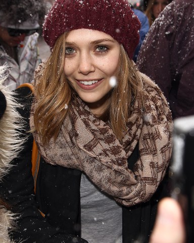 Elizabeth Olsen is seen on Main Street in Park City Ut for the Sundance Film Festival on January 22,2011. (AP Photo/ Donald Traill)