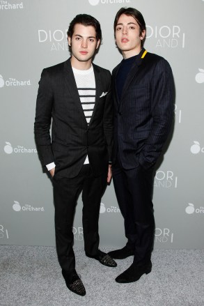 Peter Brant, left, and Harry Brant, right, attend the premiere of "Dior and I" at the Paris Theatre on Tuesday, April 7, 2015, in New York. (Photo by Andy Kropa/Invision/AP)