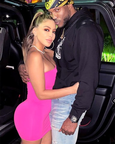 EXCLUSIVE: Larsa Pippen and Malik Beasley cuddle on a luxury yacht in these exclusive pictures taken on the basketball star’s recent 24th birthday - a date when he was expected to be celebrating at home with his wife and family. Sources close to the Minnesota Timberwolves player’s estranged wife Montana Yao had previously told TMZ that she had expected Malik to be at home for his birthday. But instead these pictures from November 26 show where he really was - living it up on a multi-million boat in Miami with new girlfriend Larsa, 24. In the pictures Larsa is seen wearing a tight pink mini dress as she hugged the basketball star. 26 Nov 2020 Pictured: Larsa Pippen and Malik Beasley. Photo credit: MEGA TheMegaAgency.com +1 888 505 6342 (Mega Agency TagID: MEGA722325_001.jpg) [Photo via Mega Agency]