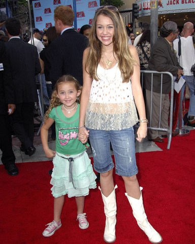 Noah Lindsey Cyrus, Miley Cyrus at arrivals for Premiere showing of MONSTER HOUSE, Mann Village Theater, Los Angeles, CA, July 17, 2006. Photo by: Michael Germana/Everett Collection