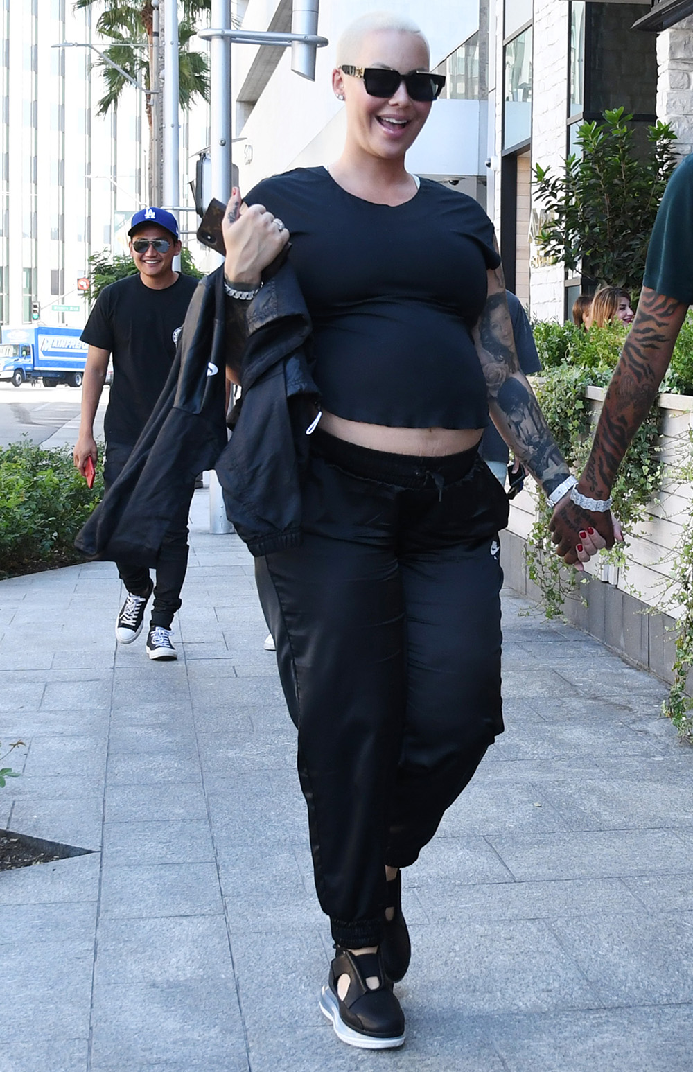 Amber Rose flaunts her famous form in grey leggings