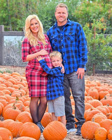 EXCLUSIVE: Spencer and Heidi Pratt have some fun with their son Gunner at a local pumpkin patch. Heidi, who is pregnant with her second child, was seen goofing around and posing for pictures with her husband Spencer and 4 year old son Gunner. The happy family were seen posing with pumpkins, on a pick up truck, and really getting into the halloween spirit. 14 Oct 2022 Pictured: Heidi Montag, Spencer Pratt and Gunner Pratt. Photo credit: Snorlax / MEGA TheMegaAgency.com +1 888 505 6342 (Mega Agency TagID: MEGA907698_007.jpg) [Photo via Mega Agency]
