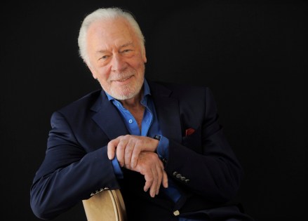 FILE - Christopher Plummer poses for a portrait on July 25, 2013, in Beverly Hills, Calif. Plummer, the dashing award-winning actor who played Captain von Trapp in the film “The Sound of Music” and at 82 became the oldest Academy Award winner in history, has died. He was 91. Plummer died Friday morning, Feb. 5, 2021, at his home in Connecticut with his wife, Elaine Taylor, by his side, said Lou Pitt, his longtime friend and manager.. (Photo by Chris Pizzello/Invision/AP, File)