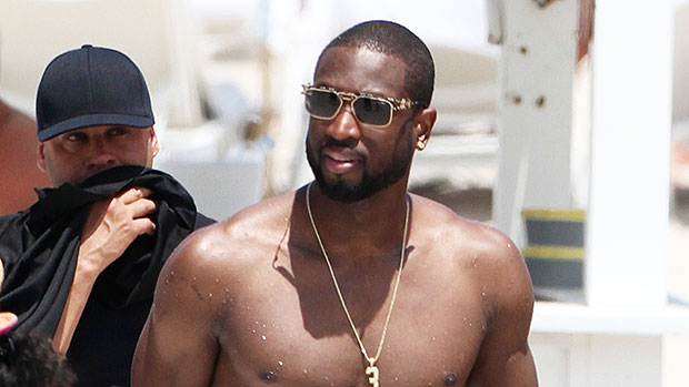 NBA All-Star Dwyane Wade Fles His Menswear Muscles with The Tie