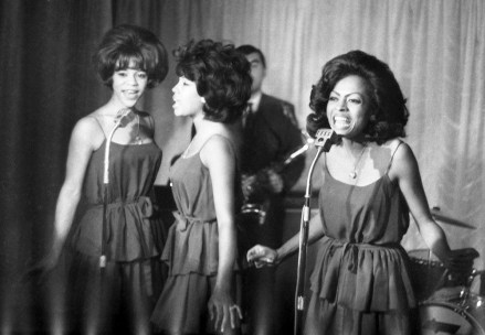 FILE - In this Oct. 8, 1964 file photo, The Supremes, from left, Florence Ballard, Mary Wilson and Diana Ross, perform during a reception for them in a hotel, in London. Wilson, the longest-reigning original Supreme, has died at 76 years old. Publicist Jay Schwartz says Wilson died Monday, Feb. 8, 2021, at her home in Las Vegas and that the cause was not immediately clear. (AP Photo/Bob Dear, File)