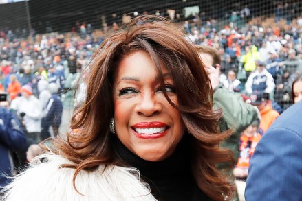 FILE - In this April 4, 2019, file photo, Mary Wilson, a former member of The Supremes, is escorted after singing the national anthem before a baseball game between the Detroit Tigers and the Kansas City Royals in Detroit. Wilson died in Las Vegas, publicist Jay Schwartz told KABC-TV. When she died and other details weren’t immediately clear. She was 76. (AP Photo/Carlos Osorio, File)