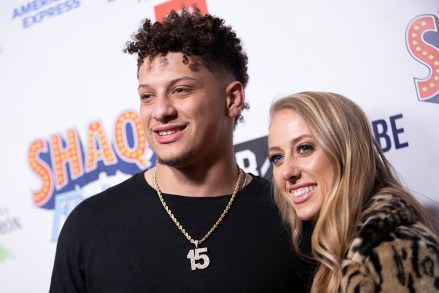 FILE - Kansas City Chiefs quarterback Patrick Mahomes and Brittany Matthews arrive at Shaq's Fun House at Live! at the Battery Atlanta in Atlanta, in this  Friday, Feb. 1, 2019, file photo. The National Women's Soccer League is returning to Kansas City after an ownership group led by local businesspeople that includes the fiancé of Chiefs quarterback Patrick Mahomes was awarded an expansion franchise Monday, Dec. 7, 2020. (Photo by Omar Vega/Invision/AP, File)