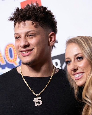 FILE - Kansas City Chiefs quarterback Patrick Mahomes and Brittany Matthews arrive at Shaq's Fun House at Live! at the Battery Atlanta in Atlanta, in this  Friday, Feb. 1, 2019, file photo. The National Women's Soccer League is returning to Kansas City after an ownership group led by local businesspeople that includes the fiancé of Chiefs quarterback Patrick Mahomes was awarded an expansion franchise Monday, Dec. 7, 2020. (Photo by Omar Vega/Invision/AP, File)