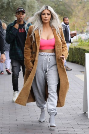 Calabasas, CA  - *EXCLUSIVE*  - Reality star Kim Kardashian stops by XO Bloom flower shop to grab some Valentine's Day flowers in Calabasas. Kim was rocking a brown fur coat over a pink tube top, grey sweatpants and grey heels. The pink tube top looked to be a size too small as it was almost stretched to its limits.Pictured: Kim Kardashian, Kris JennerBACKGRID USA 14 FEBRUARY 2018 BYLINE MUST READ: BAHE / BACKGRIDUSA: +1 310 798 9111 / usasales@backgrid.comUK: +44 208 344 2007 / uksales@backgrid.com*UK Clients - Pictures Containing ChildrenPlease Pixelate Face Prior To Publication*