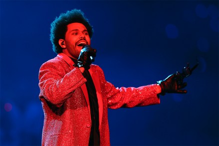 The Weeknd performs during the halftime show of the NFL Super Bowl 55 football game between the Kansas City Chiefs and Tampa Bay Buccaneers, Sunday, Feb. 7, 2021, in Tampa, Fla. (AP Photo/Chris Carlson)