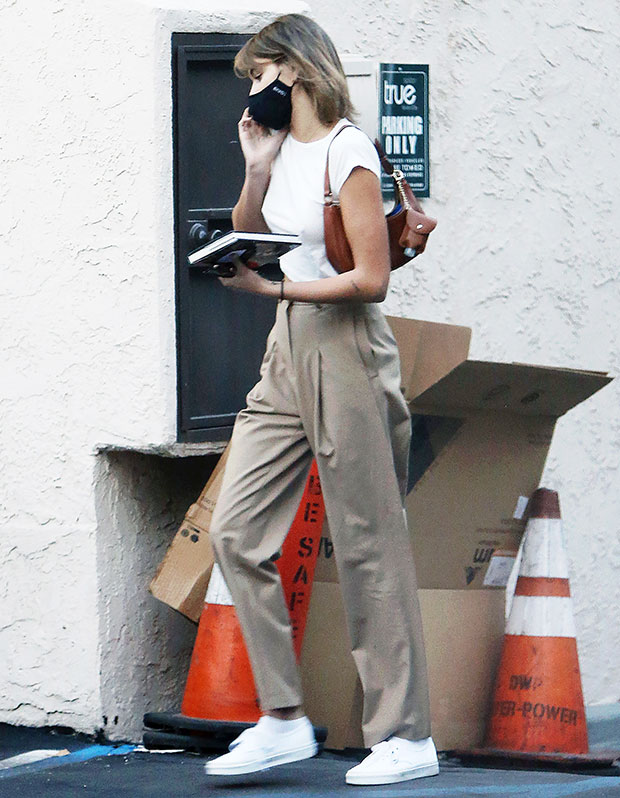 Kaia Gerber Wears Leggings, Tube Socks & Ugg Mini Boots Post Workout