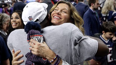 Gisele Bundchen & Tom Brady Hugging at the Super Bowl