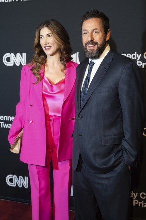 Mark Twain Prize recipient Adam Sandler, right, and his wife, Jackie Sandler arrive on the red carpet at the start of the 24th Annual Mark Twain Prize for American Humor at the Kennedy Center for the Performing Arts, in Washington
Mark Twain Prize Sandler, Washington, United States - 19 Mar 2023